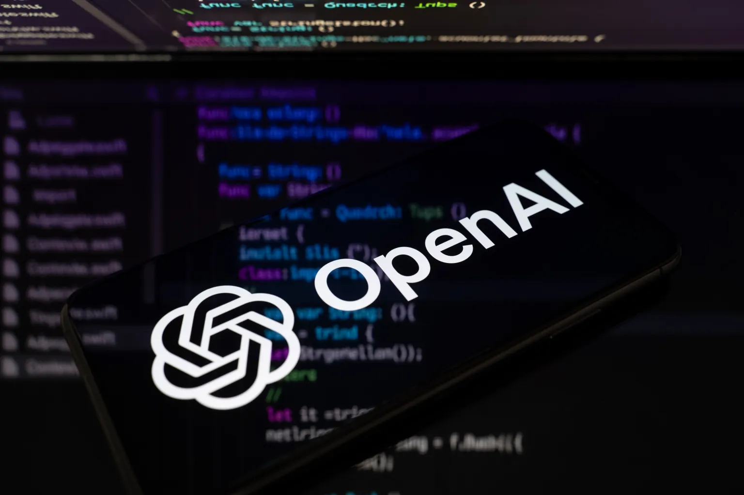 openai-logo-code-background.webp